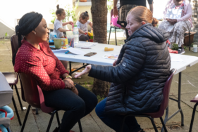 Tammy, on the right, speaks to another mother during a day of activities at the ATD Fourth World centre in Southwark.