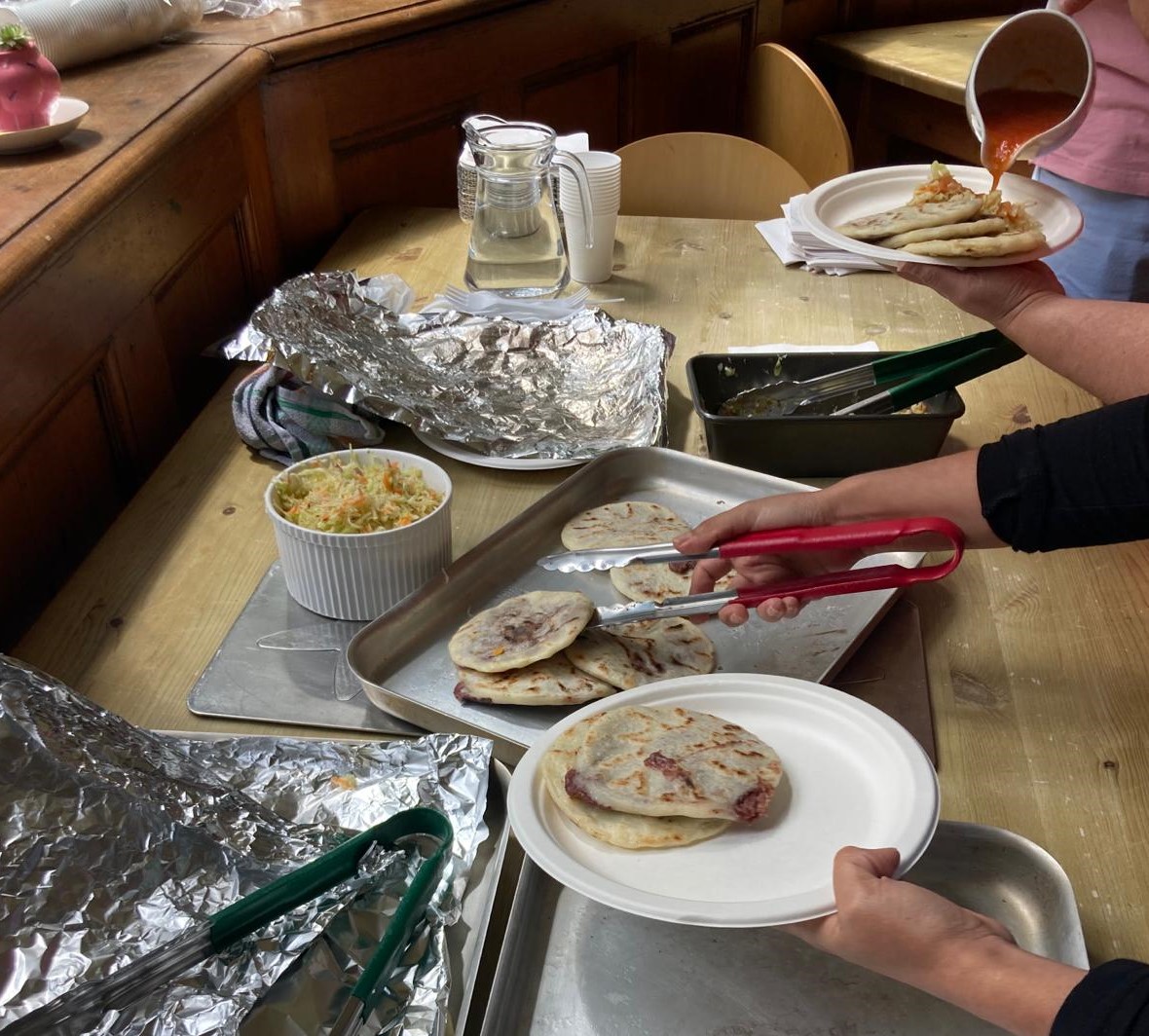 Traditional Latin American food 'Pupusa' is being served on plates. 